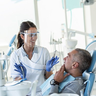 Dentist explaining treatment to patient