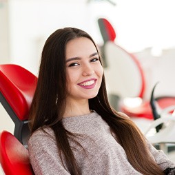 A woman who’s happy with her cosmetic dental work